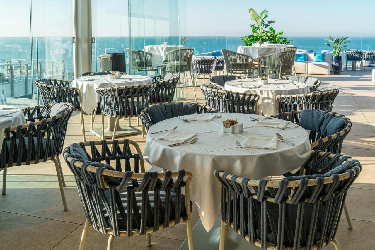 The One Caorle - Hotel & Apartments Esterno foto Restaurant