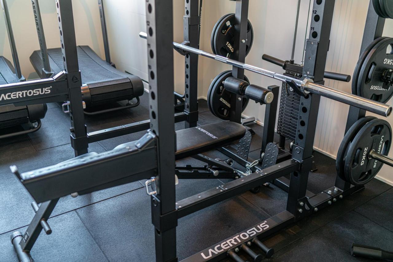The One Caorle - Hotel & Apartments Esterno foto A power rack with a safety catch